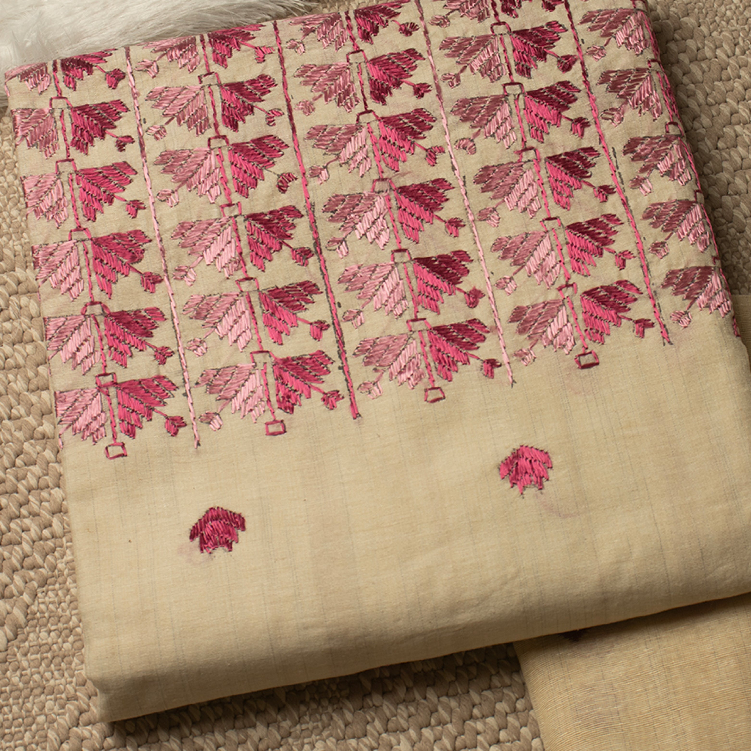 Sindhi Kadhai embroidered white and pink unstitched suit