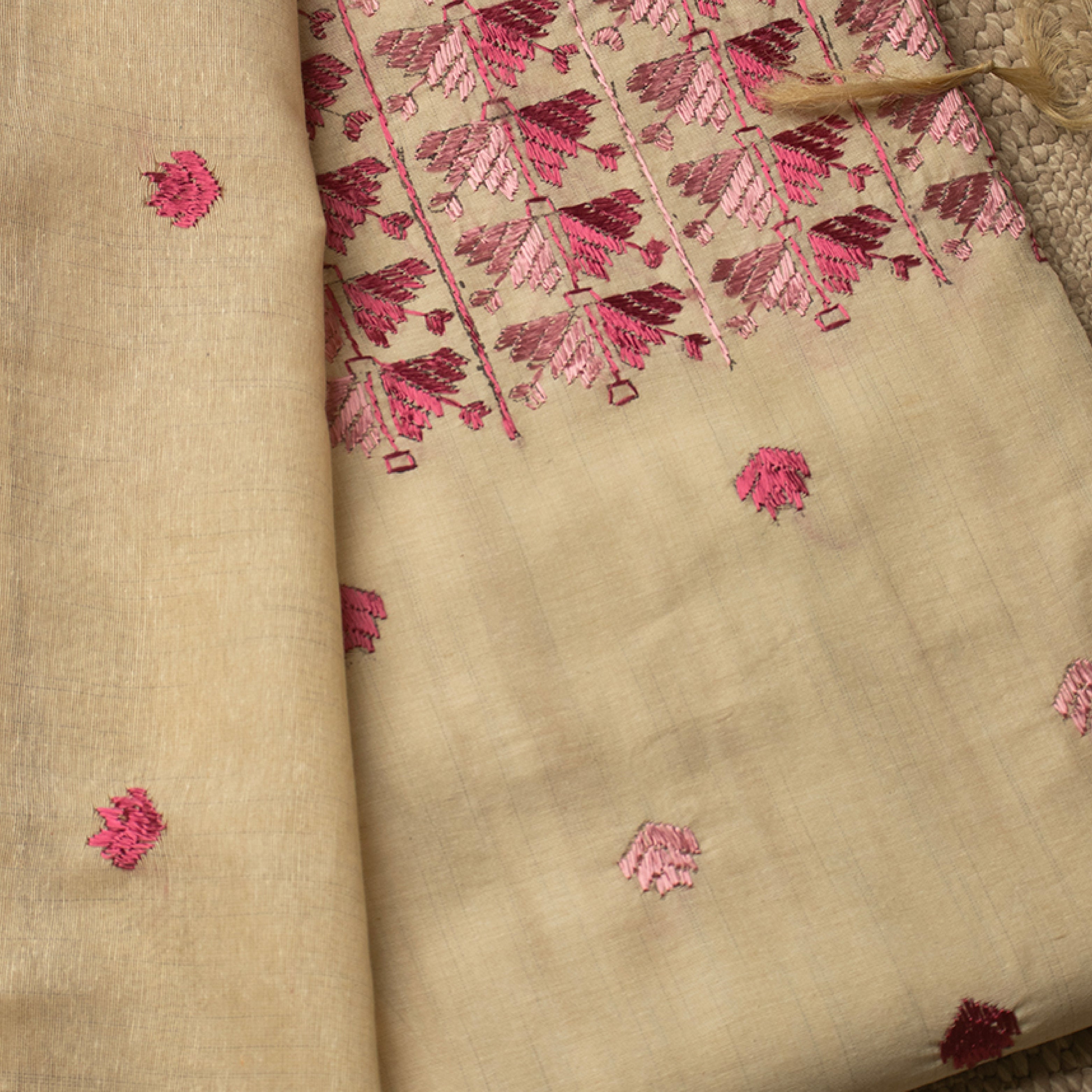 Sindhi Kadhai embroidered white and pink unstitched suit