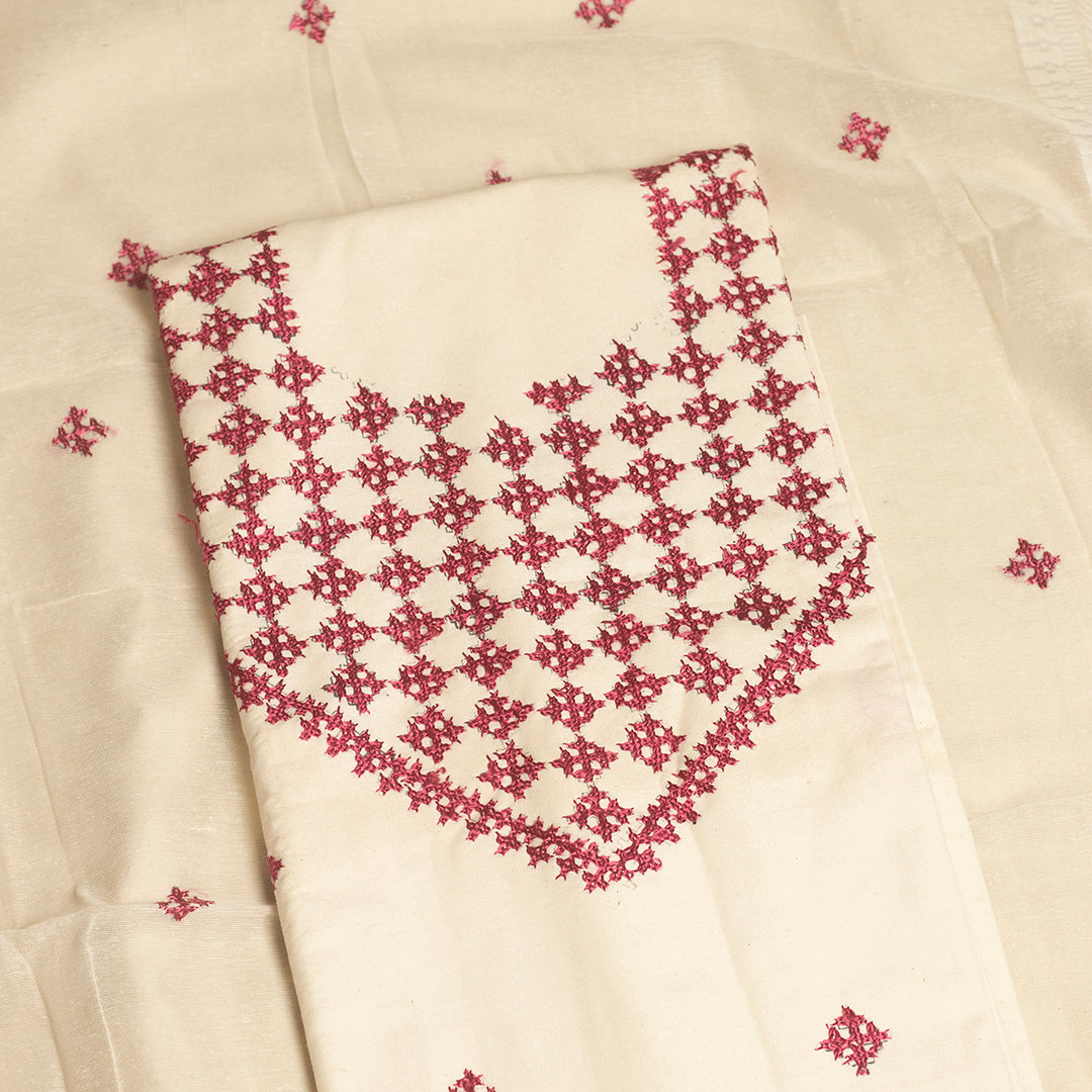 Sindhi Kadhai embroidered cream & Magenta unstitched suit